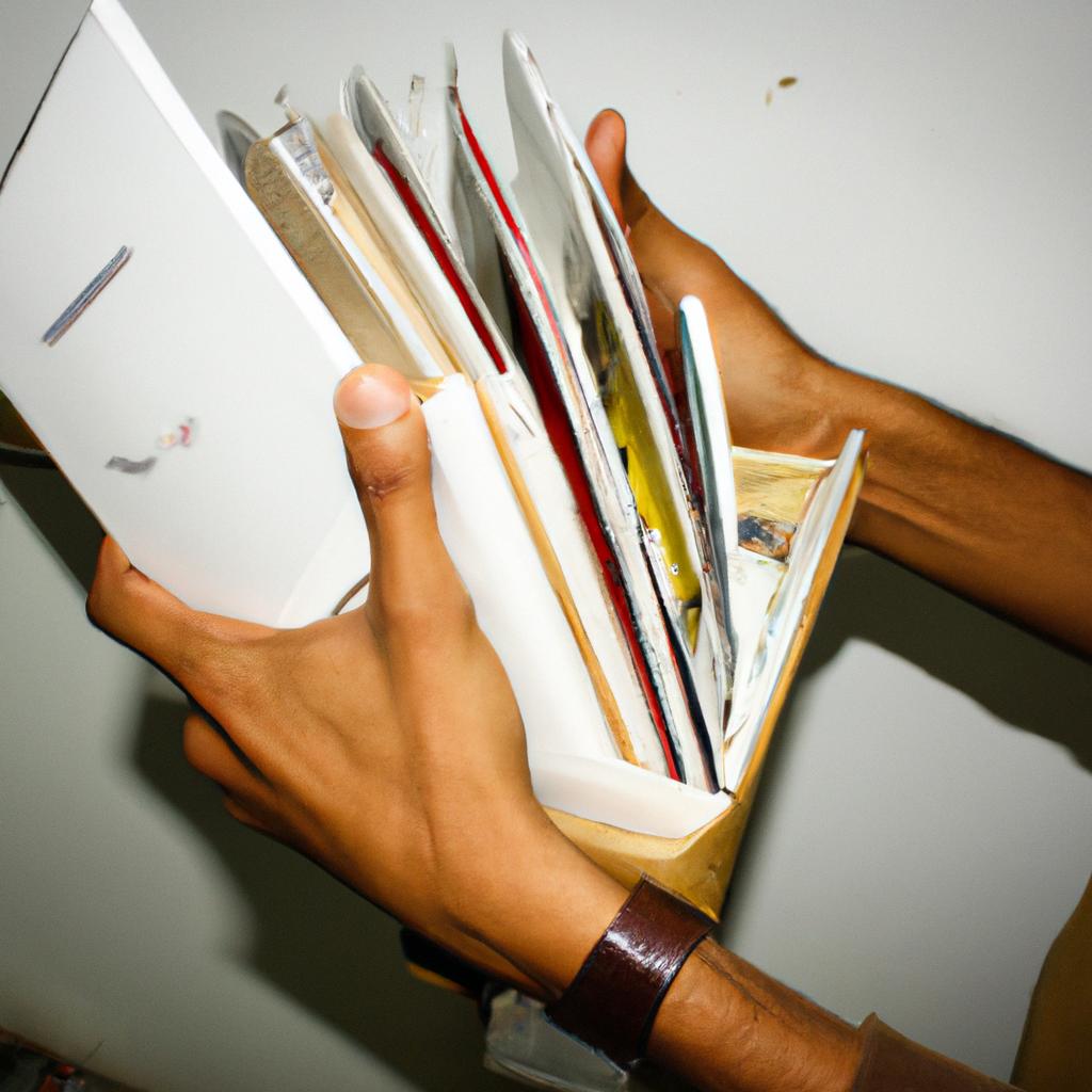 Person holding and organizing directories