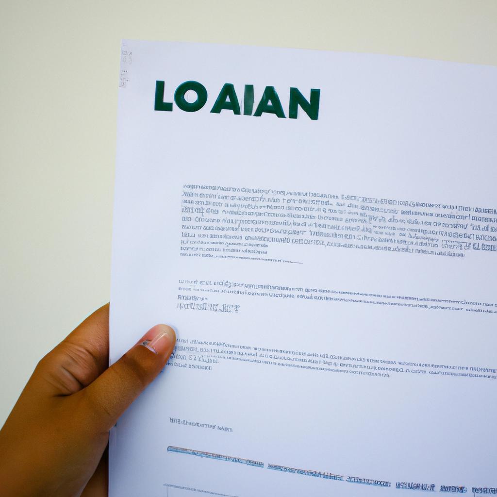 Person holding a loan document